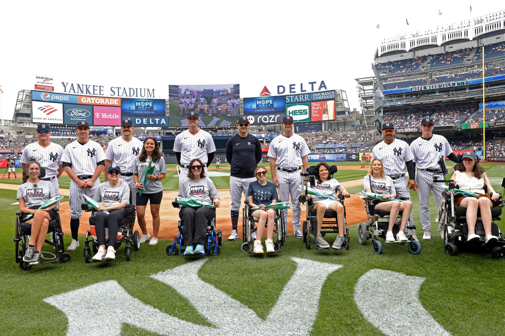 Members of Her ALS Story with New York Yankees