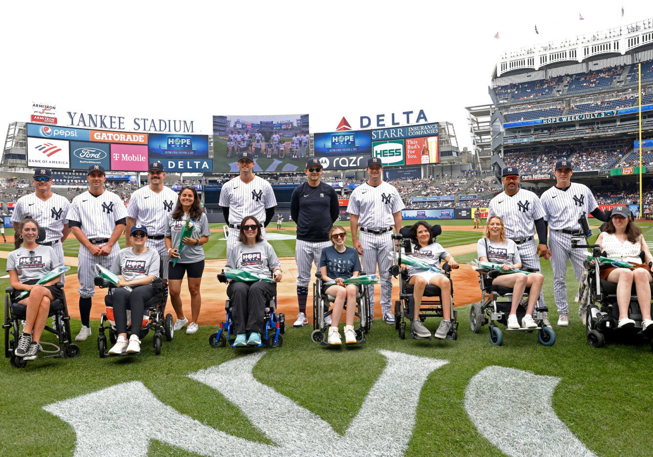 Members of Her ALS Story with New York Yankees